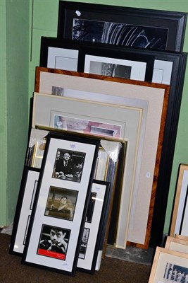 Lot 1200 - A quantity of framed photographic prints including moored boats, misty New York skylines,...