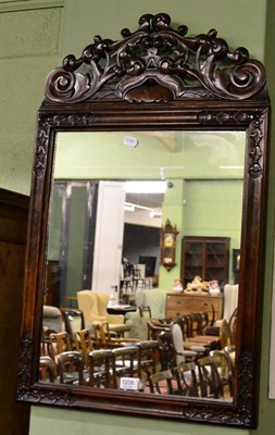 Lot 1208 - An 18th century style carved rectangular mirror