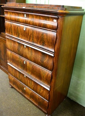 Lot 1215 - A Victorian style flame mahogany six height chest of drawers, label to interior, Thompson,...