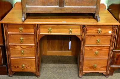 Lot 1221 - A pine kneehole desk