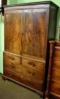 Lot 1224 - A George III mahogany linen press