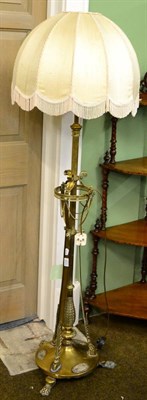 Lot 1230 - An empire style brass standard lamp