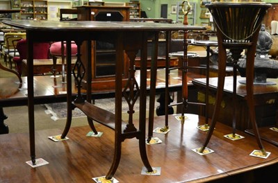 Lot 1237 - An Edwardian Sutherland table, a cake stand and a jardiniere stand (3)