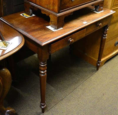 Lot 1239 - A Victorian mahogany two drawer writing table