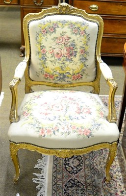 Lot 1254 - A Louis XV style gilt and gesso open armchair