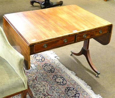 Lot 1257 - A cross banded and string inlaid mahogany sofa table