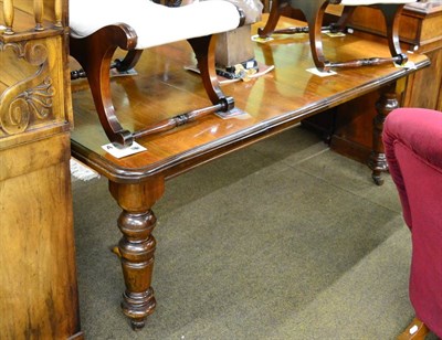 Lot 1259 - A Victorian mahogany wind out extending dining table