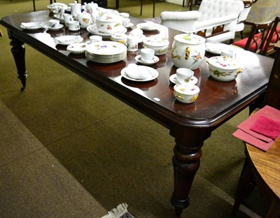 Lot 1263 - A mahogany extending dining table on heavy turned supports, bearing brass plaque 'Osborne House'