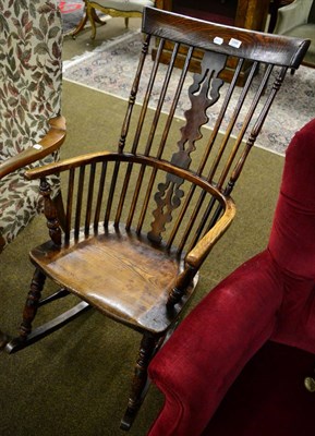 Lot 1266 - An elm Windsor rocking chair (rocker replaced)