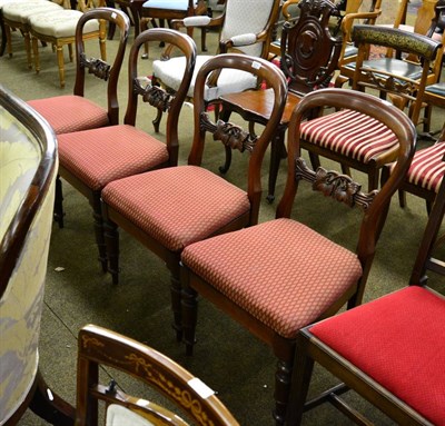 Lot 1274 - A set of four mahogany balloon back chairs