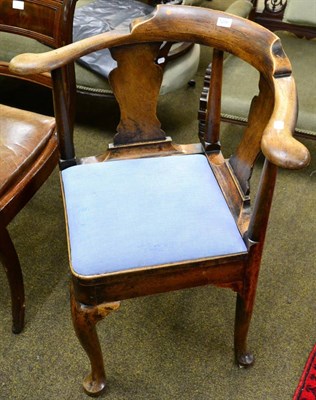 Lot 1286 - A George III corner chair on bun feet