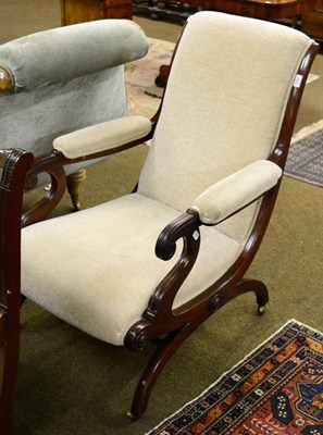 Lot 1288 - A 19th century mahogany framed library chair, on down swept supports, purchased from Anthemion...