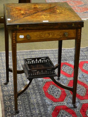 Lot 1293 - An Edwardian marquetry inlaid, rosewood envelope card table