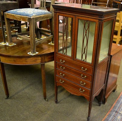 Lot 1306 - An Edwardian string inlaid display and music cabinet