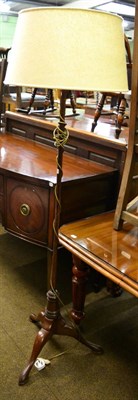 Lot 1314 - A mahogany tripod standard lamp