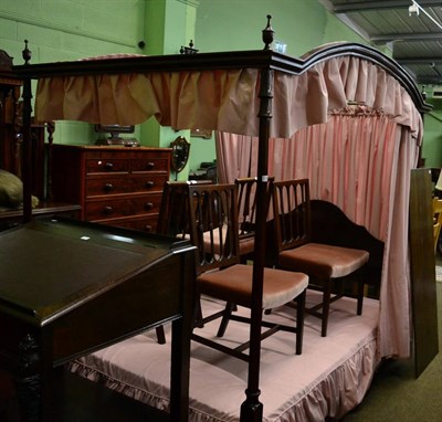 Lot 1320 - A reproduction four poster bed