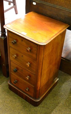 Lot 1322 - A mahogany pedestal four drawer bedside chest