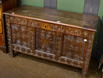 Lot 1337 - A carved oak coffer with initials J.R to the front