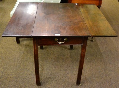 Lot 1338 - A George III mahogany Pembroke table on square tapering legs