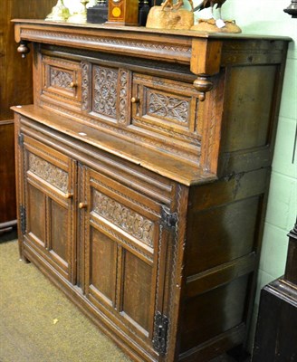 Lot 1347 - A 17th century style oak court cupboard of typical design