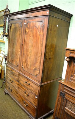 Lot 1348 - A George III mahogany linen press