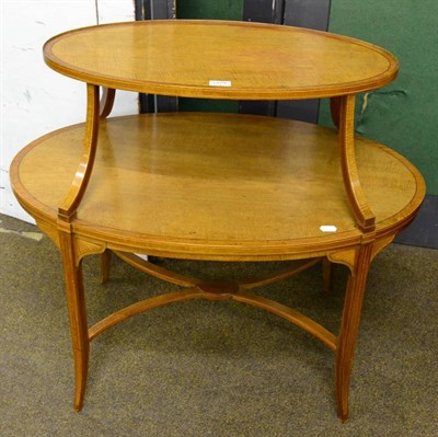 Lot 1379 - An Edwardian satinwood two tier etagere, labelled Edwards & Roberts, largest tier 89cm wide