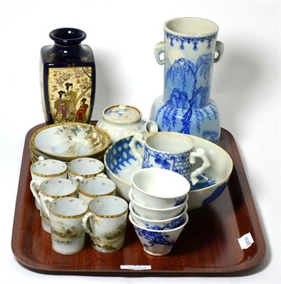 Lot 11 - Japanese blue and white vase, bowl, six egg shell cups and saucers, wine pot and four bowls,...