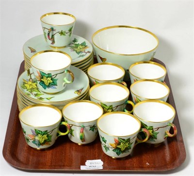 Lot 20 - A 19th Century Davenport Longport part tea service, handpainted ivy and butterfly design on...