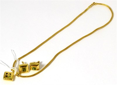 Lot 44 - An 18 carat gold peridot necklace and earring suite