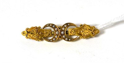 Lot 49 - A Victorian seed pearl crescent brooch, stamped '15CT'