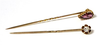 Lot 67 - An old cut diamond stick pin, estimated diamond weight 0.20 and a garnet stick pin (2)