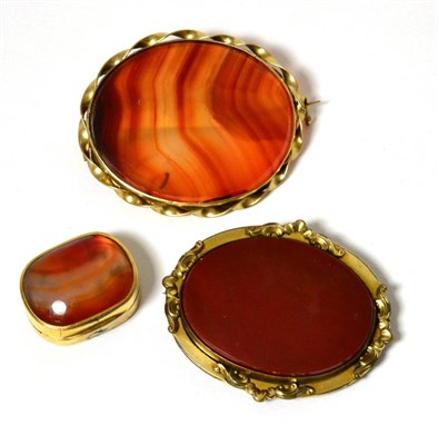 Lot 69 - Two agate set brooches together with an agate set vinaigrette (3)