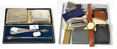 Lot 77 - Two silver cigarette cases, Ronson lighters, silver handled button hook and shoe horn