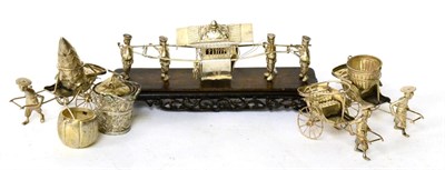 Lot 99 - A group of Chinese export silver models and condiments, including three rickshaws; a melon form...