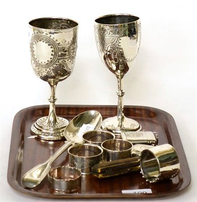 Lot 109 - Two silver presentation goblets, silver tablespoon, five silver napkin rings, two silver vesta...