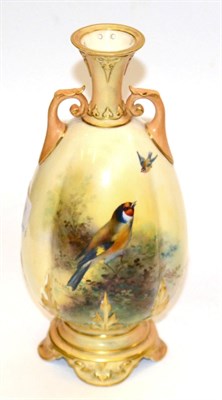 Lot 117 - Royal Worcester twin handled vase, painted with a song bird, signed E Barker