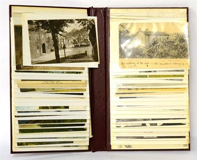 Lot 122 - Four albums of postcards