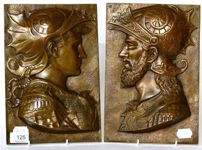 Lot 125 - A pair of Aesthetic style patinated metal wall plaques decorated with Mars and Venus