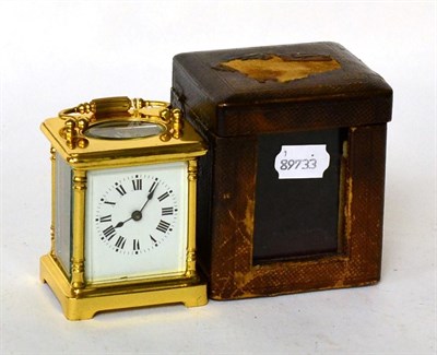 Lot 126 - A brass carriage timepiece with fitted case