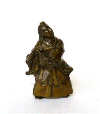 Lot 137 - A Japanese bronze of a scribe, Meiji period