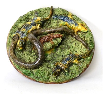 Lot 206 - A Palissy ware plate, decorated with a snake and crocodiles