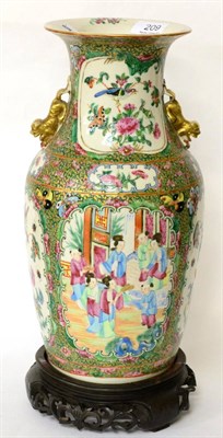 Lot 209 - A late 19th century Chinese Canton porcelain baluster vase on wood stand