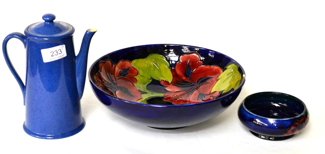 Lot 233 - A large Walter Moorcroft Hibiscus bowl (damaged), a William Moorcroft Powder Blue coffee pot...