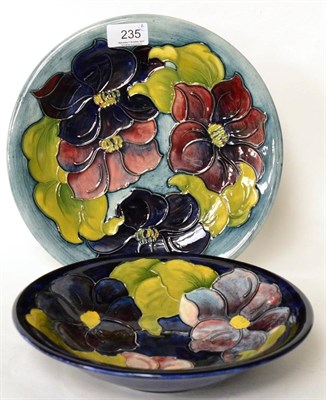 Lot 235 - A Walter Moorcroft Clematis pattern bowl and plate (2)