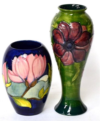 Lot 236 - A Walter Moorcroft Magnolia pattern vase and an Anemone pattern vase (2)