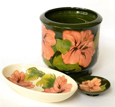 Lot 238 - Moorcroft pottery Coral Hibiscus jardiniere and two dishes