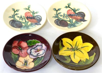 Lot 240 - Moorcroft pottery group of four coasters including Finch and Berry pattern