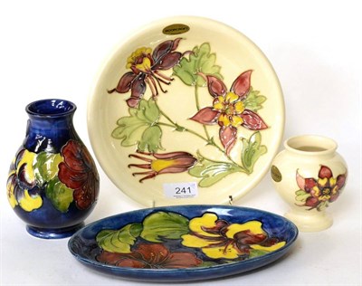 Lot 241 - Walter Moorcroft: Hibiscus pattern oval dish and baluster vase, together with a Columbine plate and