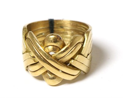 Lot 271 - A knot ring, stamped '750'