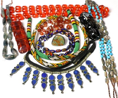 Lot 290 - Horn and bead necklaces, an Indian lapis lazuli necklace, African beaded necklace and other...